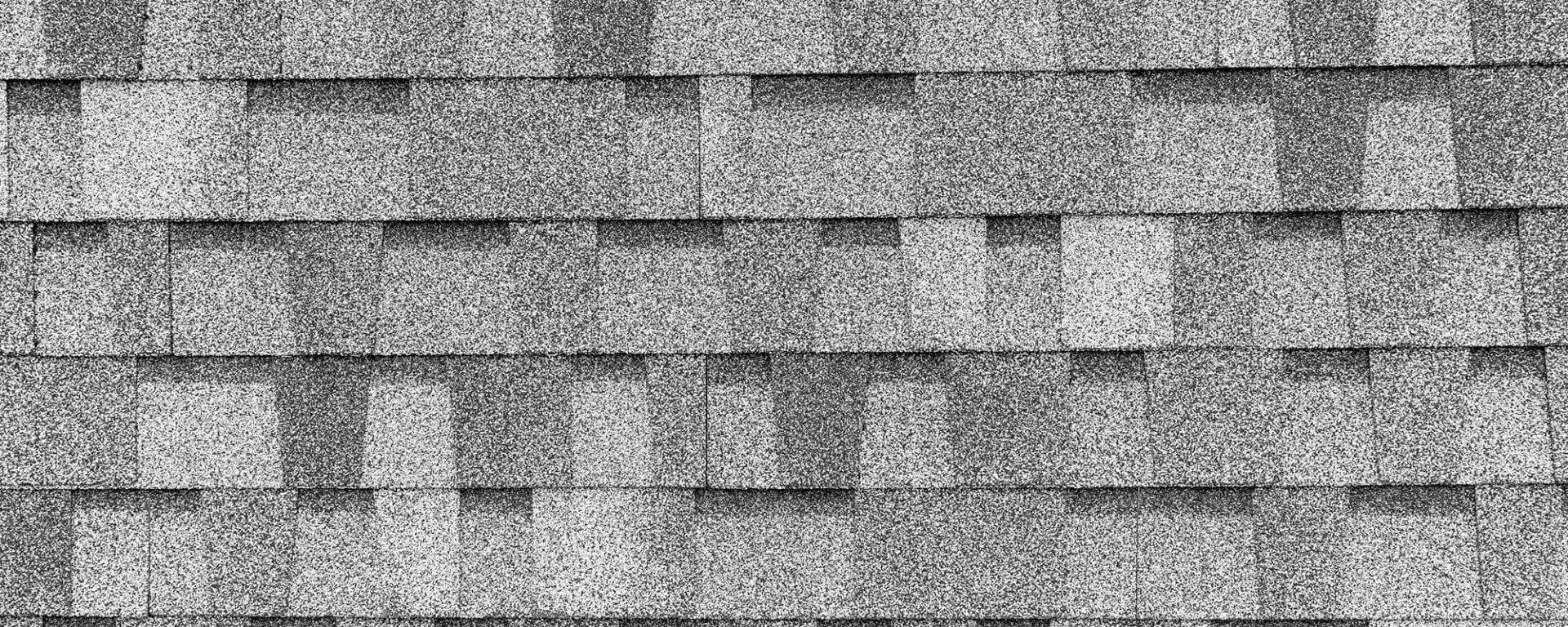 A grey speckled tiled roof